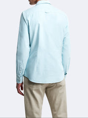 Chemise bleu clair manches longues Devred adaptée handicap senior par Adapt & Joy, coupe slim en coton biologique.