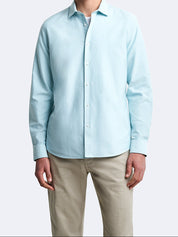 Chemise bleu clair manches longues Devred adaptée handicap senior par Adapt & Joy, coupe slim en coton biologique.