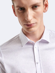 Chemise manches longues fleuri Devred adaptée handicap senior par Adapt & Joy, coupe extra-slim en polyester avec col semi-italien, élégante et facile à enfiler.