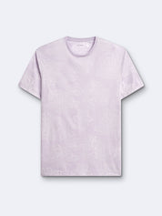 T-shirt fleuri à manches courtes et col rond Devred adapté par Adapt & Joy, offrant élégance, confort et facilité d’habillage pour les personnes en situation de handicap ou seniors.