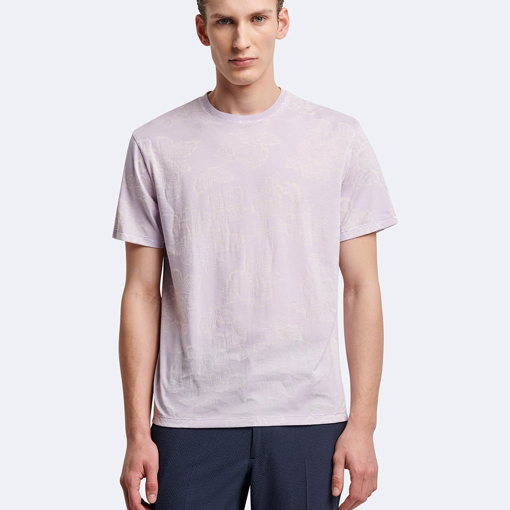 T-shirt fleuri à manches courtes et col rond Devred adapté par Adapt & Joy, offrant élégance, confort et facilité d’habillage pour les personnes en situation de handicap ou seniors.