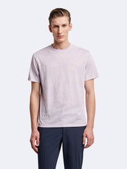 T-shirt fleuri à manches courtes et col rond Devred adapté par Adapt & Joy, offrant élégance, confort et facilité d’habillage pour les personnes en situation de handicap ou seniors.