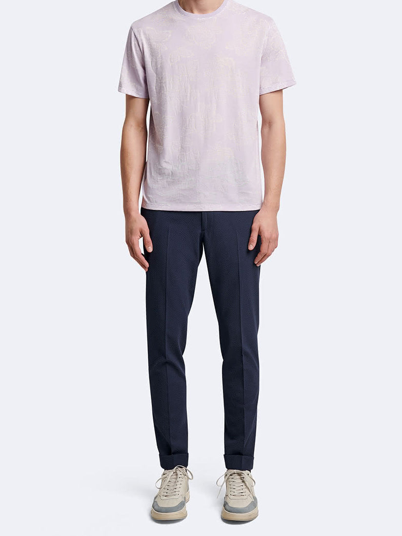 T-shirt fleuri à manches courtes et col rond Devred adapté par Adapt & Joy, offrant élégance, confort et facilité d'habillage pour les personnes en situation de handicap ou seniors.