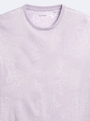 T-shirt fleuri à manches courtes et col rond Devred adapté par Adapt & Joy, offrant élégance, confort et facilité d’habillage pour les personnes en situation de handicap ou seniors.